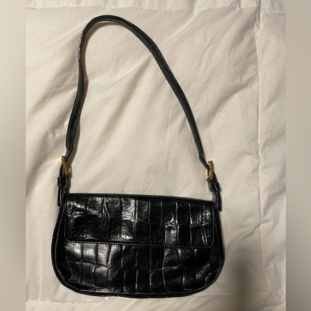 Jones New York leather clutch with strap.